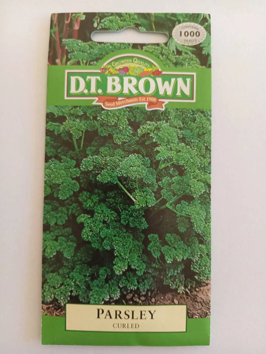 Seed packet for curly parsley with D.T. Brown branding on a white background